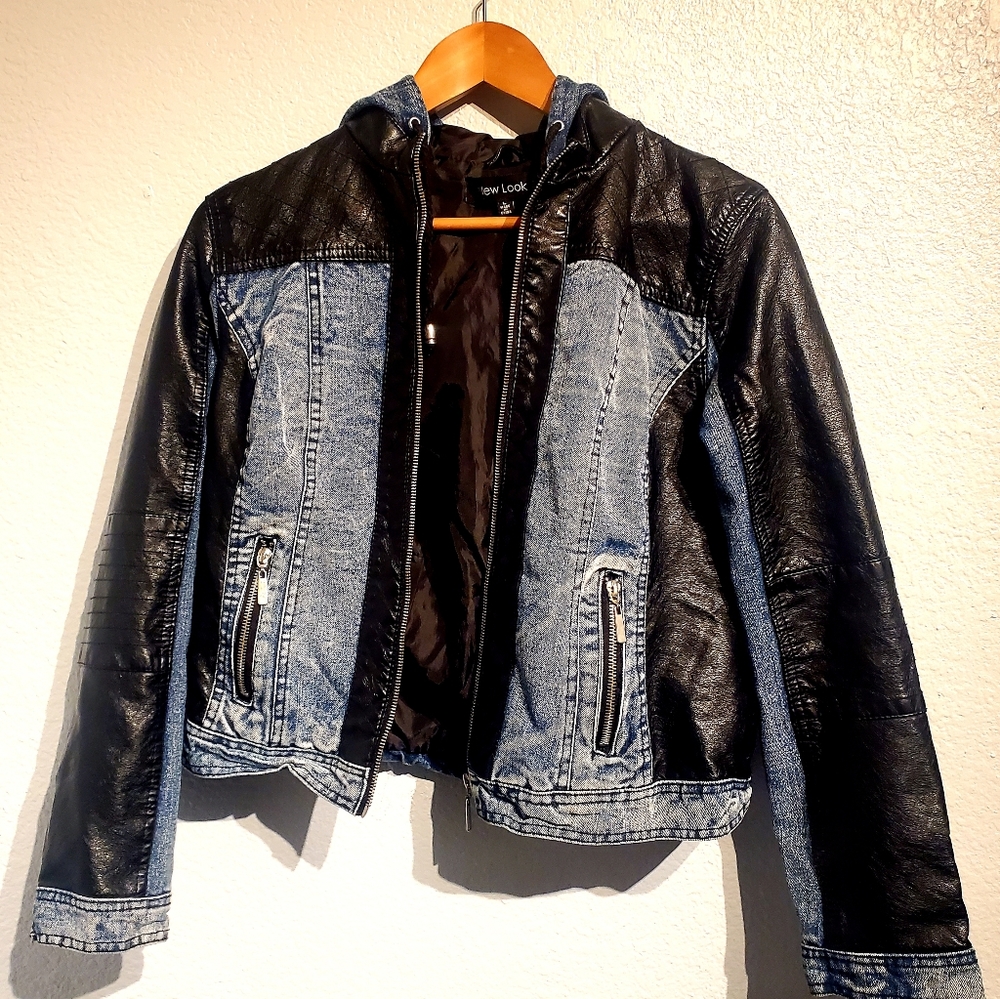 Leather/denim jacket with sewn in designs.